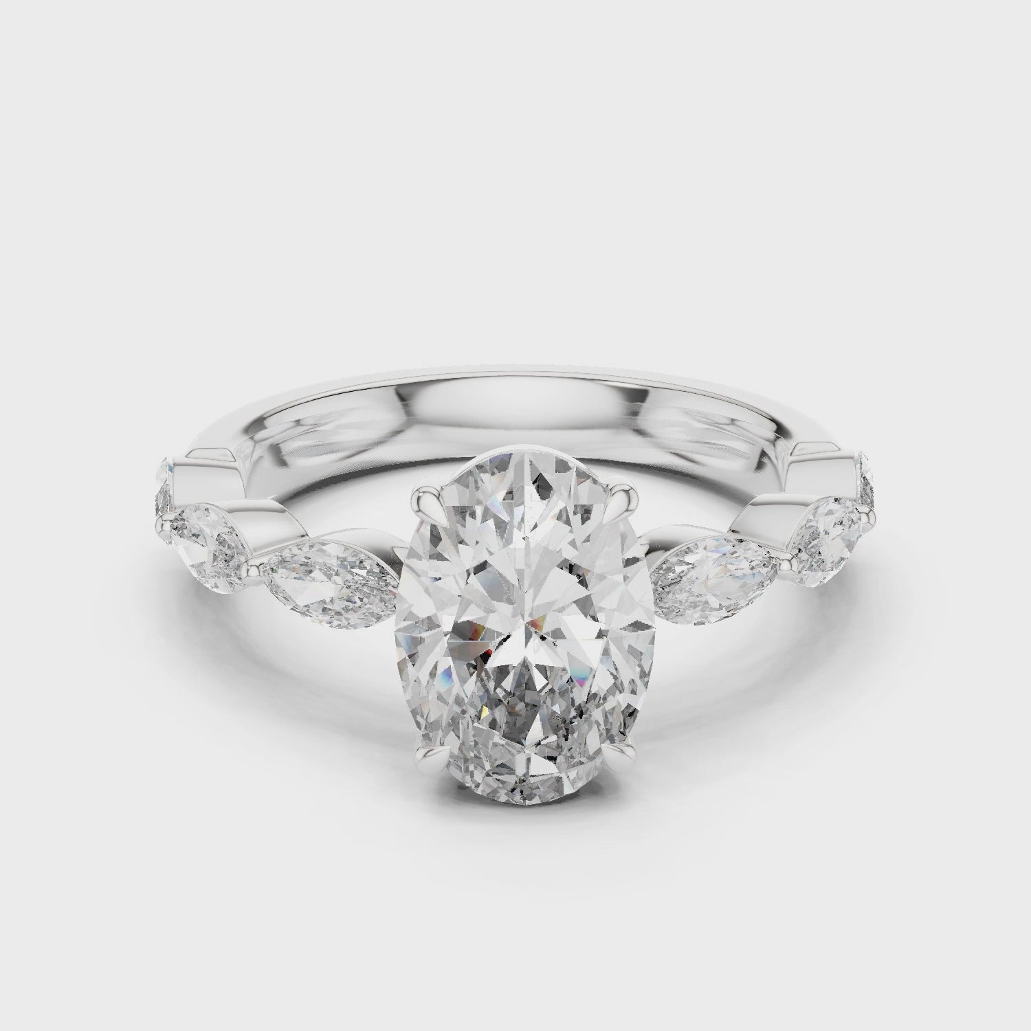Oval-cut diamond ring with marquise diamond shank

Lab-grown diamond engagement ring with alternating marquise accents

Elegant oval and marquise diamond fine jewelry ring