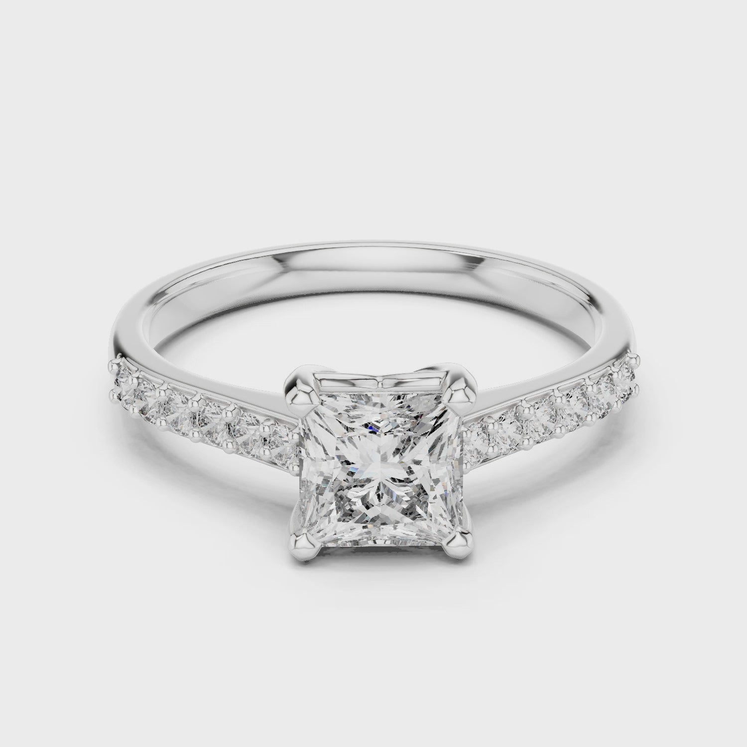 Princess-cut lab-grown diamond engagement ring with pavé band

Elegant princess-cut diamond ring in white gold

Close-up of princess-cut center stone with pavé-set band