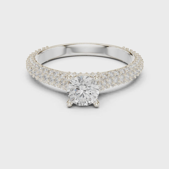 Round solitaire engagement ring with five rows of pavé diamonds

Lab-grown diamond solitaire ring with pavé band in white gold

Luxury bridal engagement ring with sparkling multi-row pavé