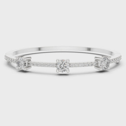 Lab-grown diamond trio bracelet featuring three round diamonds in polished metal finish