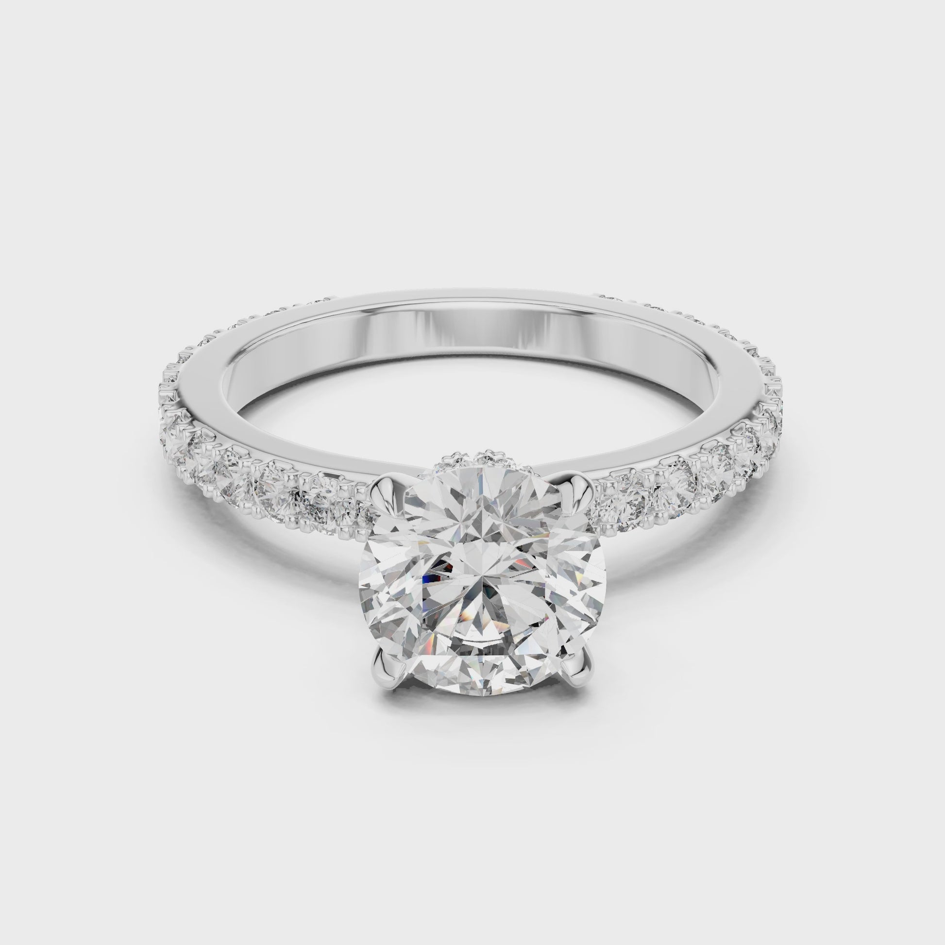 Atria Secret Double Halo diamond engagement ring with round center stone and pavé band