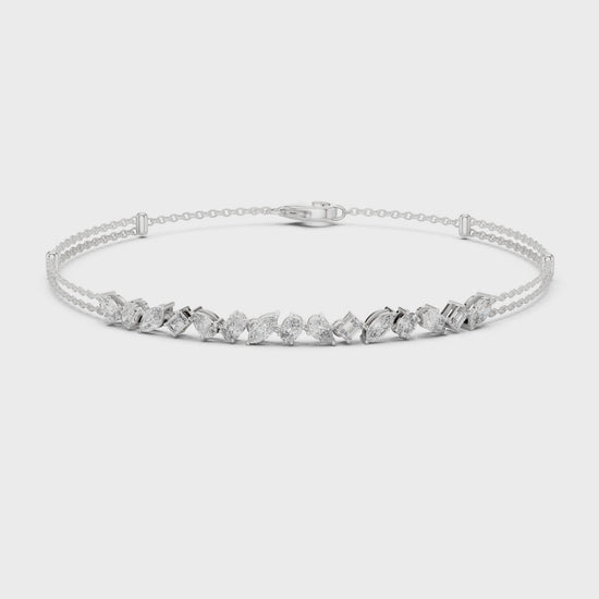 Multi-shape diamond bracelet featuring mixed-cut diamonds in a polished metal setting