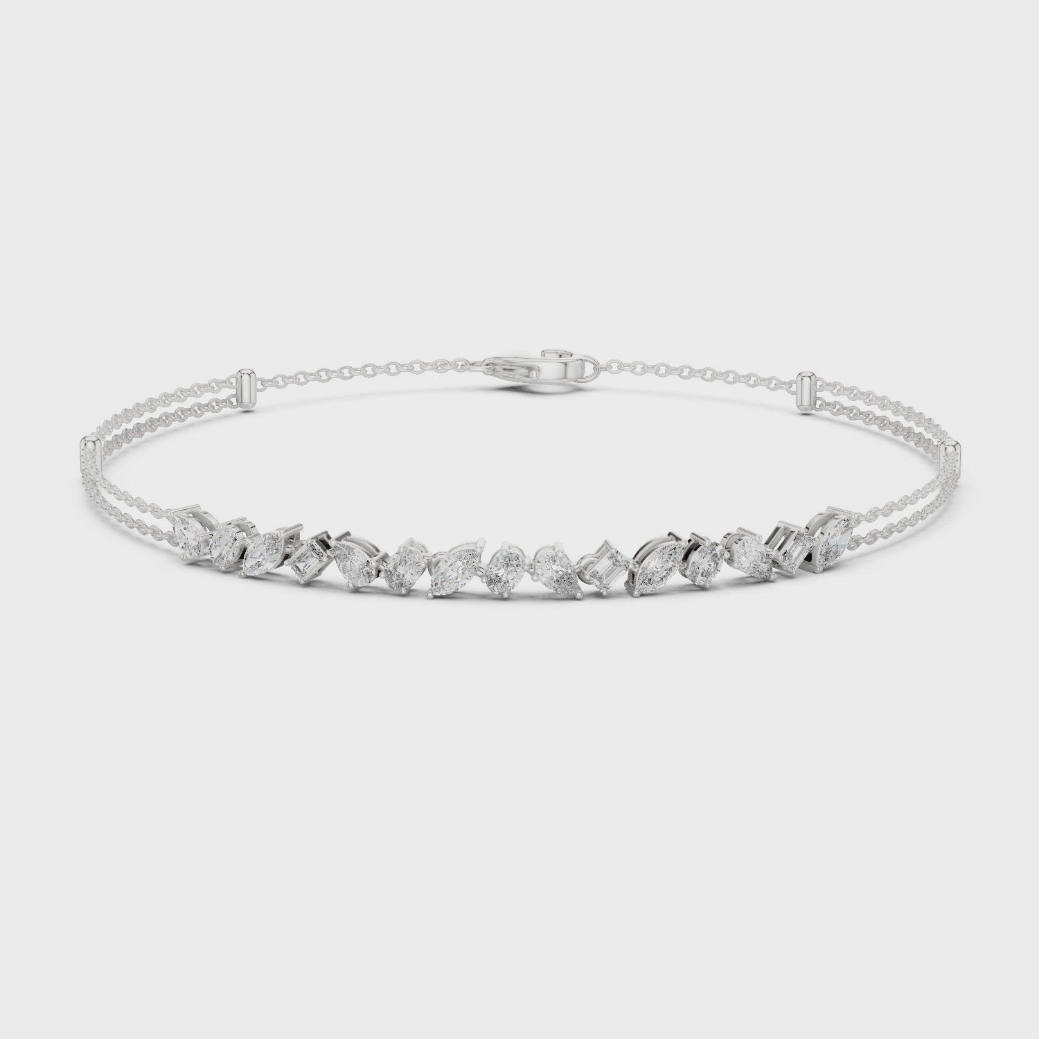 Multi-shape diamond bracelet featuring mixed-cut diamonds in a polished metal setting