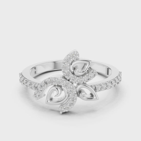 Diamond floral swirl ring featuring a curved leaf cluster design in a high-polish finish